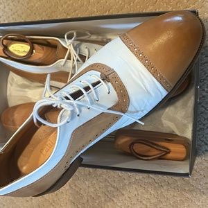White/tan cap toe lace ups size 9